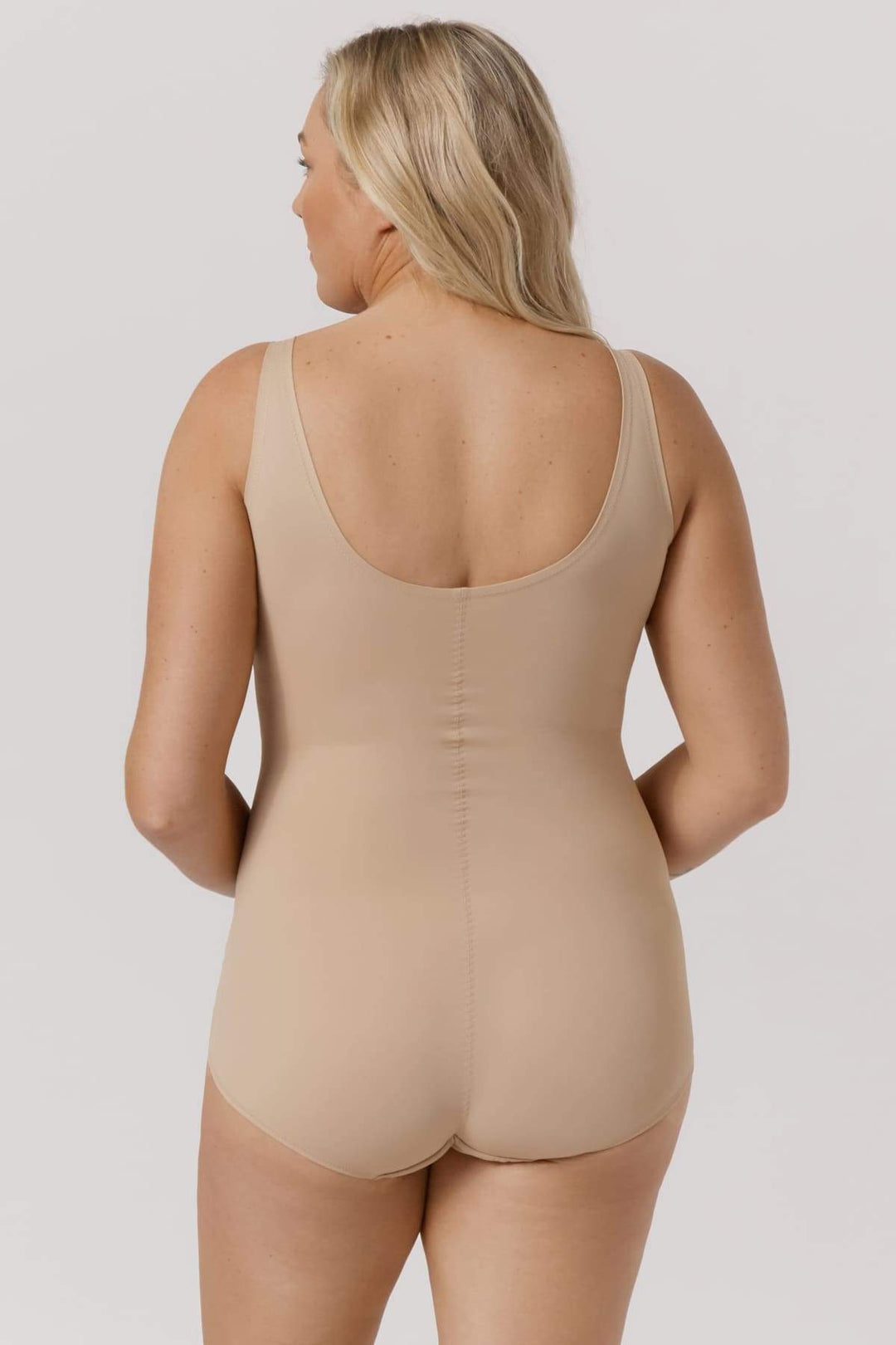 Curve Control Bodysuit I Woman wearing shaping bodysuit model I Bella Bodies I Taupe I back